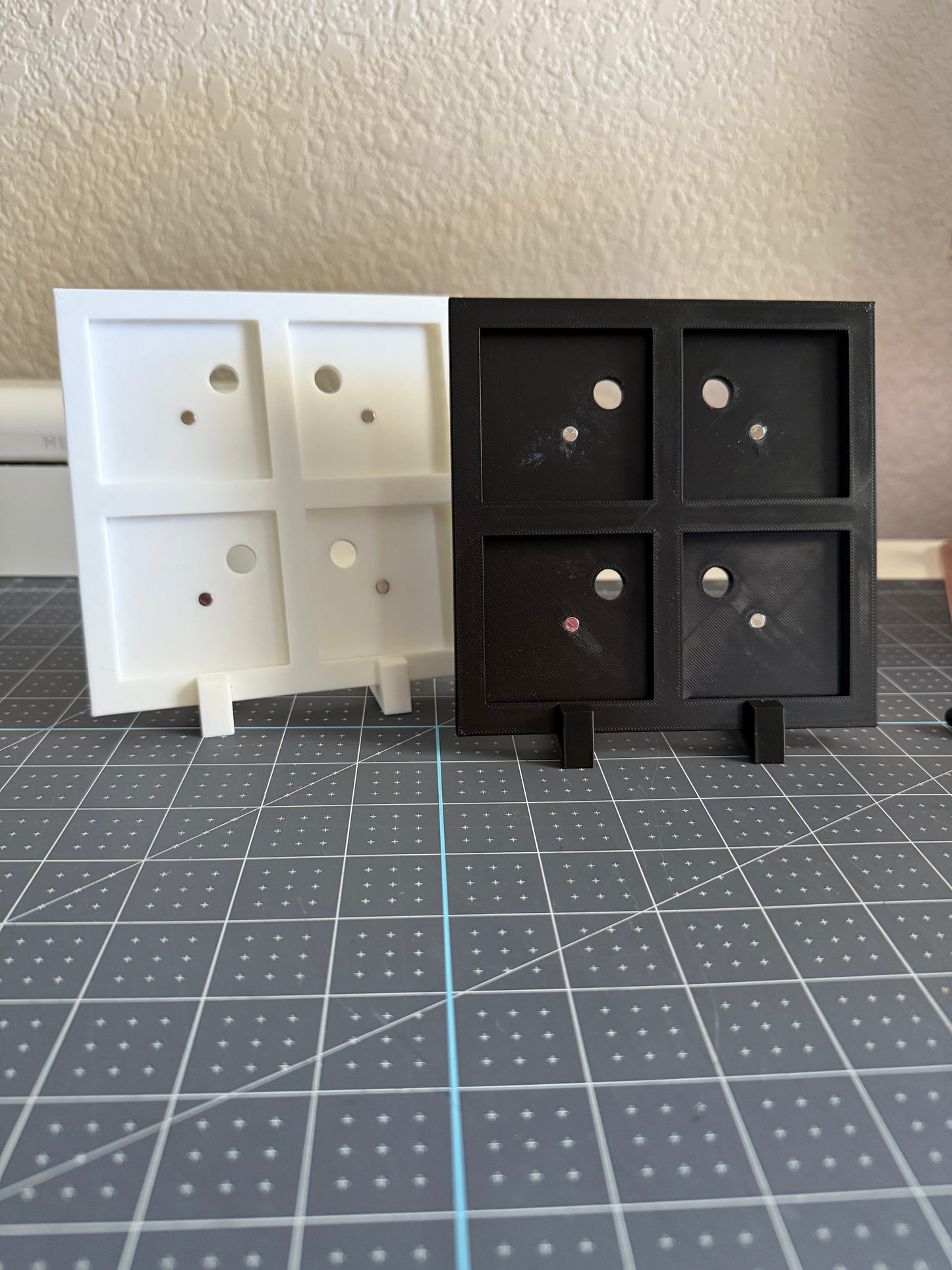 White and black 3D Printed frame models.
